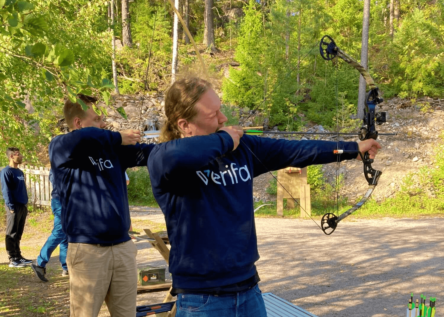 Verifa team practicing archery
